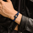 Load image into Gallery viewer, Model wearing a blue nautical bracelet
