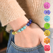 Load image into Gallery viewer, Model wearing chakra bracelet
