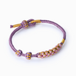 Load image into Gallery viewer, Pulsera con nudo de flor morada ‘Be Brave and Be Strong’ para nieta en fondo blanco

