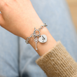 Load image into Gallery viewer, female model wearing Personalized Initial Engraved Heart Memorial Bracelet
