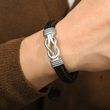 Load image into Gallery viewer, Braided Leather Bracelet worn by a male model
