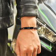 Load image into Gallery viewer, Black bracelet with name engraving on male model

