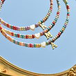 Load image into Gallery viewer, creative shot of &quot;To My Granddaughter, Keep Me In Your Heart Personalized Colorful Beads Choker&quot;  letters K,M, and A
