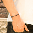 Load image into Gallery viewer, morse code bracelet in a male model
