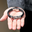 Load image into Gallery viewer, Love You Forever engraved linked bracelet on a male model&#39;s hand.
