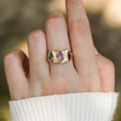 Load image into Gallery viewer, Female model&#39;s hand wearing the &quot;To My Mom, “I Love You” Personalized Birthstone Ring&quot; three birthstones variant
