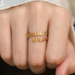 Load image into Gallery viewer, Gold Double Name Ring with the names Rachel and Mason on model finger
