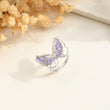Load image into Gallery viewer, Creative shot of purple variant of Double Butterfly Ring
