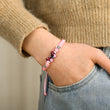 Load image into Gallery viewer, Model wearing pink variant of Butterfly Charm Bracelet
