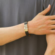 Load image into Gallery viewer, model wearing the gold personalized leather bracelet
