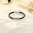Load image into Gallery viewer, Love My Grandson Braided Leather Bracelet on top of a white fabric
