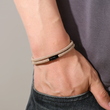Load image into Gallery viewer, Khaki Double Layer Bracelet on a man&#39;s hand.
