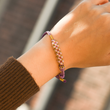 Load image into Gallery viewer, Female model wearing the purple variant of To My Beautiful Daughter, Always Keep Me in Your Heart Blossom Knot Bracelet
