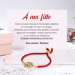 Load image into Gallery viewer, Bracelet de protection contre le mauvais œil en fil rouge posé sur une carte message de SVANA Design.
