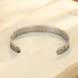 Load image into Gallery viewer, To My Lovely Wife, I Can’t Live Without You Bracelet on a book page
