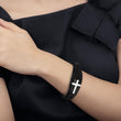 Load image into Gallery viewer, Silver cross variant of Hug From Heaven Leather Cross Bracelet on female model
