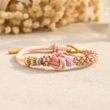 Load image into Gallery viewer, Peach Blossom Knot Bracelet in canvas
