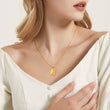 Load image into Gallery viewer, Gold Personalized Memorial Letter Envelope Necklace worn by a female model
