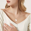 Load image into Gallery viewer, Silver Personalized Memorial Letter Envelope Necklace worn by a female model
