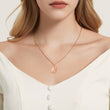 Load image into Gallery viewer, Rose Gold Personalized Memorial Letter Envelope Necklace worn by a female model
