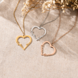 Load image into Gallery viewer, creative shot of the three variants of To Our Granddaughter Personalized Heart Pendant Necklace
