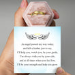 Load image into Gallery viewer, Model holding a personalized memorial plume ring and a printed message card

