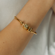 Load image into Gallery viewer, A model wearing Initial Charm Evil Eye Bangle
