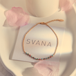 Load image into Gallery viewer, Multicolored Evil Eye Gold Chain Ankle Bracelet on top of a SVANA Design card
