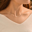 Load image into Gallery viewer, Woman wearing silver necklace with initials
