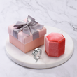 Load image into Gallery viewer, I Am Enough&#39; Ring together with cute small gift boxes placed on top of a white marble plate
