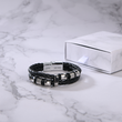Load image into Gallery viewer, To My Son, I Am So Proud of You Bracelet laying on a table near a gift box
