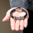 Load image into Gallery viewer, male model with To My Son, I Love You Through and Through Linked Bracelet on his open palm

