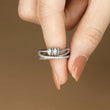Load image into Gallery viewer, model holding silver adjustable Fidget Ring
