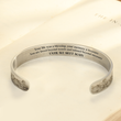 Load image into Gallery viewer, Until We Meet Again Memorial Bracelet positioned on a blank page of a book
