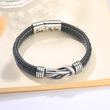 Load image into Gallery viewer, Love my son linked bracelet on a book page
