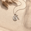 Load image into Gallery viewer, St. Michael Archangel Necklace on canvass background
