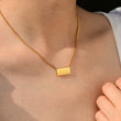 Load image into Gallery viewer, A model wearing 666 angel number pendant gold necklace
