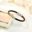 Load image into Gallery viewer, To My Son Love You Forever Thin Braided Bracelet leaning on a white SVANA  jewelry box
