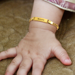 Load image into Gallery viewer, model wearing Gold Personalized Baby Name Bracelet
