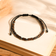 Load image into Gallery viewer, I am so proud of you in morse code bracelet for son placed on top of a blank page of a book
