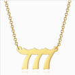 Load image into Gallery viewer, gold Angel Number 777 Necklace on a white background
