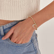 Load image into Gallery viewer, Jeweled Moon Beaded Bracelet worn by a model on her left wrist
