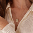 Load image into Gallery viewer, Jeweled Moon Gold Square Pendant Necklace worn by a female model
