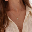 Load image into Gallery viewer, Multicolored Moon and Stars Gold Coin Necklace worn by a female model
