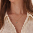 Load image into Gallery viewer, A model wearing Turquoise Stone Hamsa Hand Necklace
