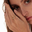 Load image into Gallery viewer, Crescent Moon Adjustable Ring worn by a female model on her index finger
