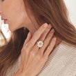 Load image into Gallery viewer, Silver Sunflower Adjustable Ring worn by a female model on her middle finger

