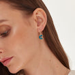 Load image into Gallery viewer, Blue Moon Gold Earrings worn by a female model
