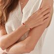 Load image into Gallery viewer, Crescent Moon Red String Bracelet worn by a model on her right wrist
