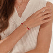 Load image into Gallery viewer, Multicolored Tree of Life Red String Bracelet on her left wrist

